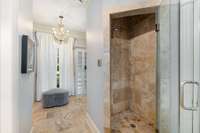 Another view of the steam shower and a peak into the accessory closet....