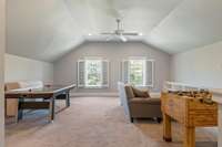 Bonus room located upstairs above the garage, plenty of space in this room plus a half bath.  Carpet is like new!