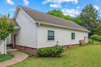 Mustic Studio attached by a breezeway to the main home