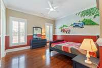 2nd bedroom with plantation shutters, Engineered hardwood floors, and a large closet.  This mural DOES conveny and has real lights that light up!