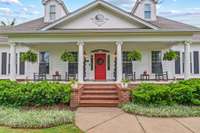 Impressive front porch on this stunning home