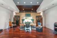 Alternate view of this amazing space. Walls are sound proof but can easily be changed to drywall if desired.
