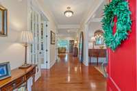 Enter into your foyer with an private office space to the left and a formal dining to the right.