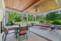 Serene screened in porch with plenty of space for table and chairs, couch and extra seating. Early  morning cup of coffee or end of day glass of your favorite beverage...maybe a nap?