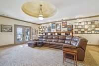 the full walkout basement features high ceilings with domed accents... not your typical basement buildout!