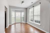 The dining room is bright and airy space perfect for everyday meals or entertaining.