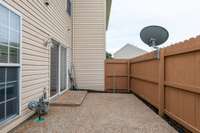Extend your living space outdoors with this cozy and functional patio.
