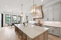Experience the heart of the home in the luxury chef’s kitchen, designed for both gourmet cooking and stylish entertaining.