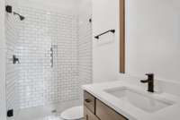 Private en suite bath with spa-like finishes, and a serene ambiance that makes every guest feel at home.