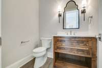 Private downstairs powder bath.
