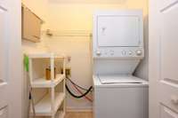 Laundry room can be used with a stackable or a side-by-side washer and dryer