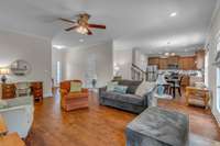 Open concept living, dining, and kitchen areas