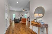 Main entrance looking towards living area with coat closet on left