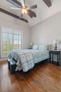 Bedroom 2 With Wood Beams And Ceiling Fan