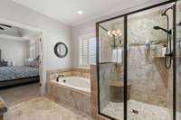 Primary Bath With Garden Tub And Walk In Tile Shower