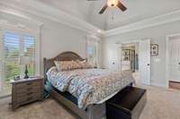 Primary Bedroom With Shutter Blinds, Walk In Closet And Full Bath
