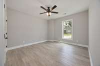 The Guest Bedroom has a quality laminate flooring and generous closet space!