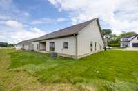 This generously sized corner lot offers an abundance of green space for the new owners!
