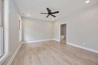The Primary Suite is located on the main level right off of the Kitchen and Dining Nook