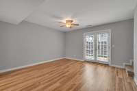 Living Room.  Looking toward the back double doors that open up to the private patio.