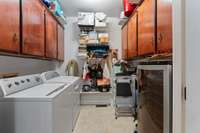 Utility room with lots of cabinet space and storage