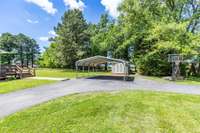Carport, shed with extra awning