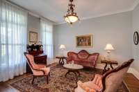 The formal Living Room, measuring 17x18, is located to the left of the front door and serves as an ideal space for receiving guests.