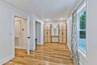 Upstairs Office/additional sleeping space with custom  white oak wardrobe and desk