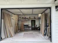 15 x 20 garage. Leads to office.