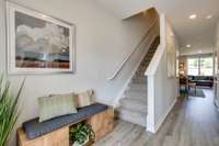 Photos of the staged model home, not of the listing.