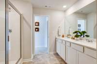Photos of the staged model home, not of the listing.