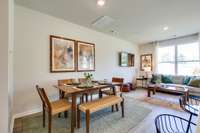 Photos of the staged model home, not of the listing.
