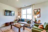 Photos of the staged model home, not of the listing.