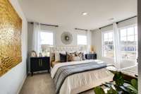 Photos of the staged model home, not of the listing.