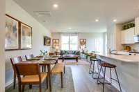 Photos of the staged model home, not of the listing.