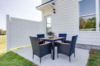 Photos of the staged model home, not of the listing.