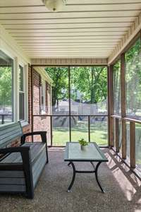 Enjoy coffee on your screened-in front porch