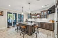 Sliding glass doors open up to the downstair porch