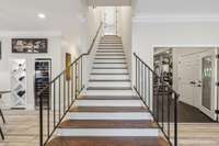 The Basement was completed in 2023 and offers Bar/Kitchen, Family Room, Gym, BR #6, 2 Baths and an additional washer/dryer
