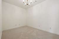 Hobby room perfect for study space or additional bathroom as it is located over the kitchen