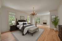 Virtually staged- Primary Bedroom on main floor with a sitting room