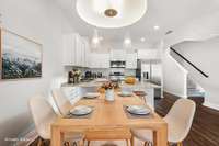 Virtually Staged  Combo dining room with enough space to entertain for holiday dinners