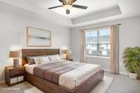 Master bedroom, this room invites in the natural sun.