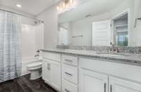 Hall bathroom upstairs - Two sinks and Tub Shower Combo - granite countertops