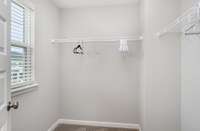 Master bedroom's large walk-in closet