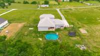 Incredible backyard with a pool, trampoline, firepit and garden. Want to add chickens? You absolutely can!