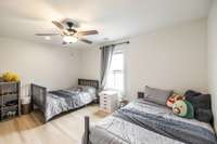 Bedroom 4 on the second floor is oversized and comfortably accommodates multiple beds.