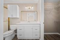 Primary bath with walk-in closet.