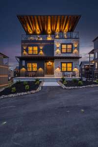 Exterior of similar cabin in community.  Developer reserves the right to alter finishes.
