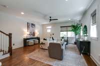 The windows throughout the house are outfitted with elegant custom shades.